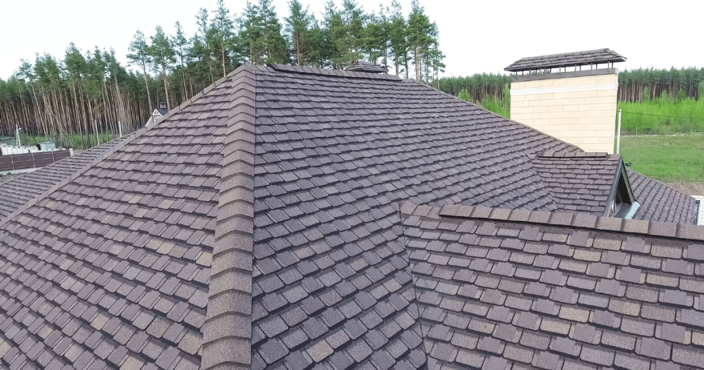 erial view of a residential roof with dark brown asphalt shingles in Champaign, IL