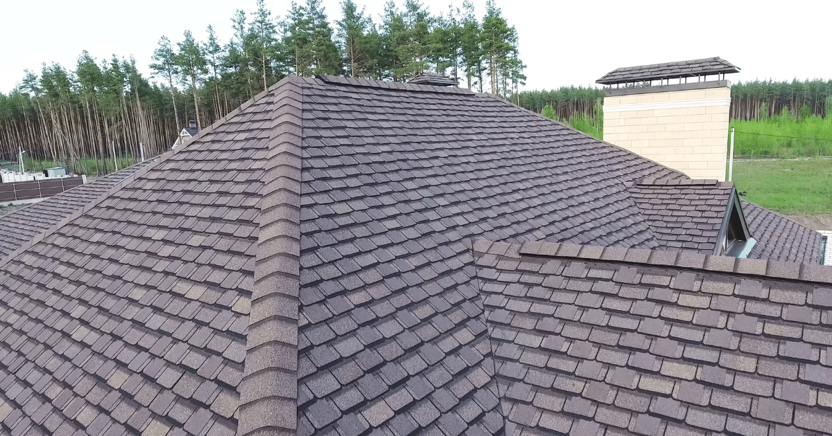 erial view of a residential roof with dark brown asphalt shingles in Champaign, IL